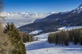 Panoramic view of wide and groomed ski piste in resort of Pila in Valle d`Aosta, Italy during winter Royalty Free Stock Photo