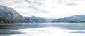 Panoramic view of wide lake and mountains around Royalty Free Stock Photo