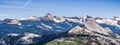 Panoramic view of wilderness areas in Yosemite National Park with mountain peaks covered in snow; Sierra Nevada mountains, Royalty Free Stock Photo