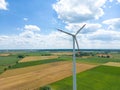 Panoramic view of wind farm or wind park, with high wind turbines for generation electricity with copy space. Green energy concept Royalty Free Stock Photo