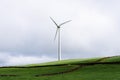 Panoramic view of wind farm or wind park, with high wind turbines for generation electricity. Royalty Free Stock Photo