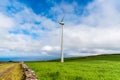 Panoramic view of wind farm or wind park, with high wind turbines for generation electricity. Royalty Free Stock Photo