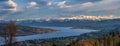 Panoramic view of Zurich lake and the snow-capped Swiss Alps from the top of Uetliberg mountain Royalty Free Stock Photo