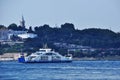 Panoramic views of the city and the strait. A tourist liner is sailing along the strait.