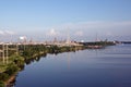 Panoramic views of the coastline on the river Neches in the day and evening time against the blue sky, clouds and sunset.