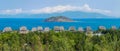 Panoramic views of the island in the blue sea, wooden bungalows and green jungle. Tropical vacation. Vietnam Royalty Free Stock Photo