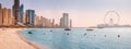 Panoramic view of the Persian Gulf beach and Bluewaters Island with the worlds famous largest Ferris wheel Dubai Eye and numerous