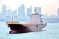 Panoramic views of the port and the city of Singapore during day and night. Kind of cargo and merchant vessels anchored. Royalty Free Stock Photo