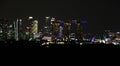 Panoramic views of the port and the city of Singapore during day and night. Kind of cargo and merchant vessels anchored. Royalty Free Stock Photo