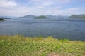 Panoramic views of reservoir,hills and blue sky at Kaeng Krachan Dam,Kaeng Krachan National Park,Phetchaburi Province, Thailand. Royalty Free Stock Photo