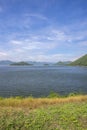 Panoramic views of reservoir,hills and blue sky at Kaeng Krachan Dam,Kaeng Krachan National Park,Phetchaburi Province, Thailand. Royalty Free Stock Photo