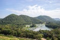 Panoramic views of reservoir,hills and blue sky at Kaeng Krachan Dam,Kaeng Krachan National Park,Phetchaburi Province, Thailand. Royalty Free Stock Photo