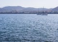 Panoramic views of sea, the mountains and yachts on Liani Ammos beach in Halkida, Greece on a Sunny summer day  the island of Evia Royalty Free Stock Photo