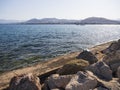 Panoramic views of sea, the mountains and yachts on Liani Ammos beach in Halkida, Greece on a Sunny summer day the island of Evia Royalty Free Stock Photo