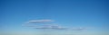 Soft spreading morning clouds on horizon, panorama. Royalty Free Stock Photo