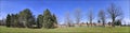 Panoramic web banner of the public park in a residential district. Tranquillity scene of a panoramic view of the park