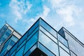 Panoramic wide angle view to steel blue background of glass high rise building skyscrapers in modern futuristic downtown Royalty Free Stock Photo