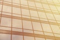 Panoramic wide angle view to steel light gold background of glass high rise building skyscraper commercial modern city Royalty Free Stock Photo