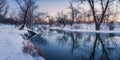 Panoramic winter landscape with trees, beautiful frozen river at