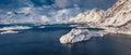 Panoramic winter view from flying drone of Sandvika bay, Leknes, Norway, Europe. Royalty Free Stock Photo