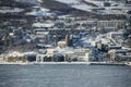 Panoramic winter wonderland landscape view of nordic Akureyri town city in Eyjafjordur Nordurland Northern Iceland