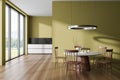 Panoramic yellow kitchen and dining room interior Royalty Free Stock Photo