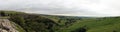 Panorma of Malham Cove landscape in Yorkshire Dales National Park in England on a cloudy day Royalty Free Stock Photo