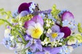 Pansy, forget-me-not, violet and lily of the valley flowers in one beautiful bouquet Royalty Free Stock Photo