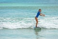 10/06/2017 Pantau Mawun, Lombok, Indonesia. Young woman learns to surf.