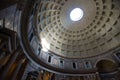 Pantheon entrance and roof of a large historic building with a large hole in the roof
