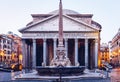 Pantheon, former Roman temple of all gods, now a church, and Fountain with obelisk at Piazza della Rotonda. Rome, Italy