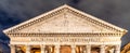 Pantheon - former Roman temple. Detailed view of tympanum. Piazza della Rotonda by night, Rome, Italy