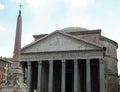 Pantheon in Rome and an ancient Egyptian obeliskand latin text m