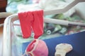 Panties and little baby cap in hospital cradle for newborns Royalty Free Stock Photo