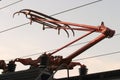 Tram pantograph in contact with the upper wires 