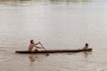 Children on a dugout canoe