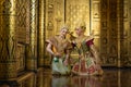 Pantomime Khon is traditional Thai classic masked play enacting scenes from the Ramayana with a backdrop of Thai paintings in a