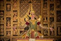 Khon is traditional Thai classic masked play enacting scenes from the Ramayana with a backdrop of Thai paintings in a