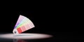 Pantone Colors Sampler Spotlighted on Black Background Royalty Free Stock Photo