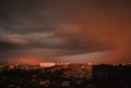 pantone 2025. Evening city in storme weather. Thunderous clouds. Royalty Free Stock Photo