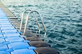 Pantone fencing of the beach. Pier of Dive Station