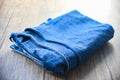 pants folded jeans pattern Fabric Used of blue jeans on wooden background