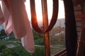 Pants and a jacket from a kimono, a blue belt for karate, hung out to dry in the sun on the balcony.