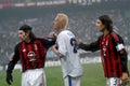 Paolo Maldini , Kaka Kaladze and Igli Tare during the match