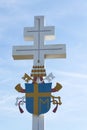 Papal coat of arms on cross, Velehrad Monastery, Czech Republic