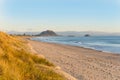 Papamoa at sunrise looking along beach Royalty Free Stock Photo