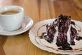 Papanasi and coffe - a traditional romanian dessert