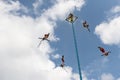 A group of voladores flyers climbing the pole to perform the traditional Danza de los Voladores Dance of the Flyers in Papantl Royalty Free Stock Photo