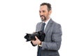 paparazzi photographer. businessman hold photo camera. photojournalist in business suit. business photographer