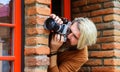 Paparazzi taking picture with photocamera. Spy Man. Private Detective. Espionage. Investigation. Royalty Free Stock Photo